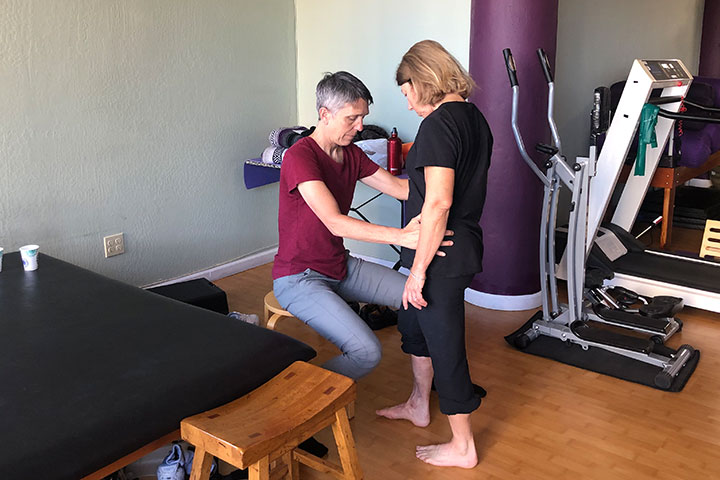 A stroke survivor receiving physical therapy