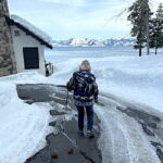 A woman standing in a snowy icy landscape