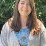 A woman with brown hair and blue eyes who is a stroke survivor