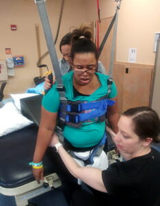 Dr. Christine Cosby-Gaither in rehab after her stroke.