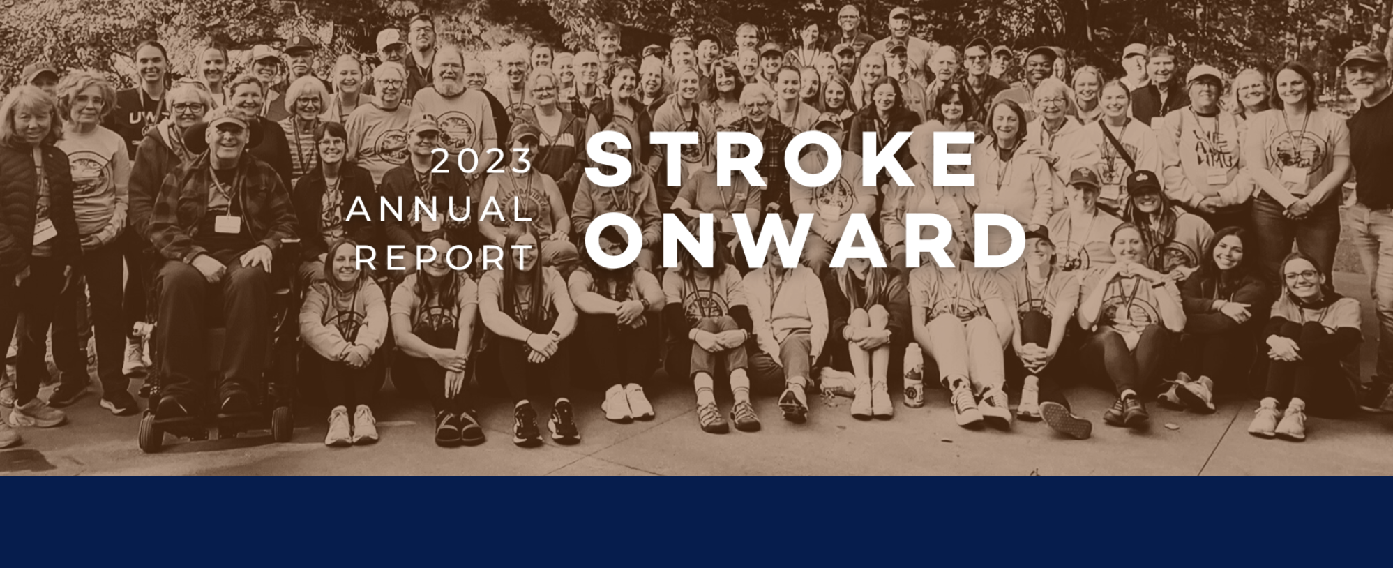 Image reading Stroke Onward 2023 Annual Report. The background image is a large group of people smiling for the camera with a sepia toned filter.